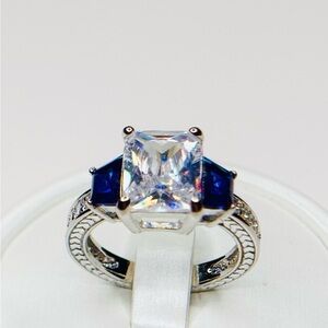 Elegant Sterling Silver Emerald Cut White Stone w/Blue Sapphire Stones